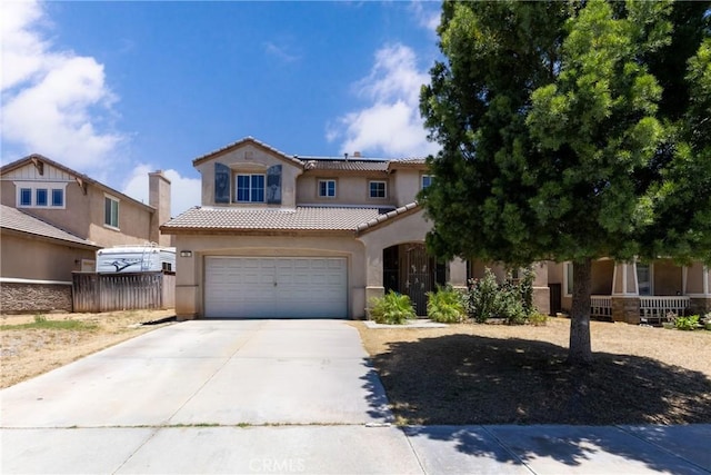 26 Billings Ave, Beaumont, CA 92223 - view of front facade featuring stucco siding, driveway, a tile roof, and roof mounted solar panels