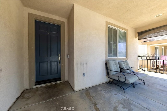 26 Billings Ave, Beaumont, CA 92223 - property entrance featuring stucco siding