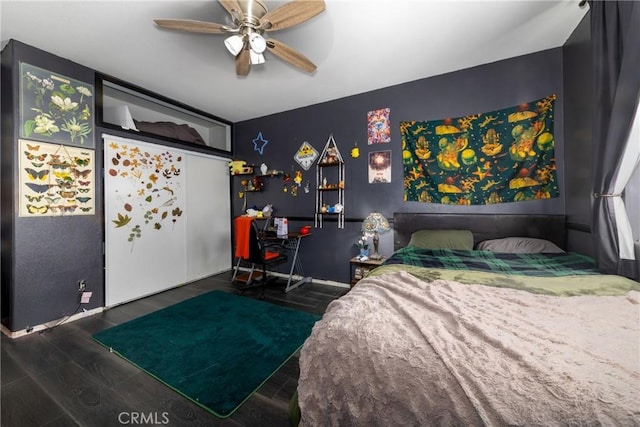 26 Billings Ave, Beaumont, CA 92223 - bedroom with wood finished floors, a desk, and ceiling fan