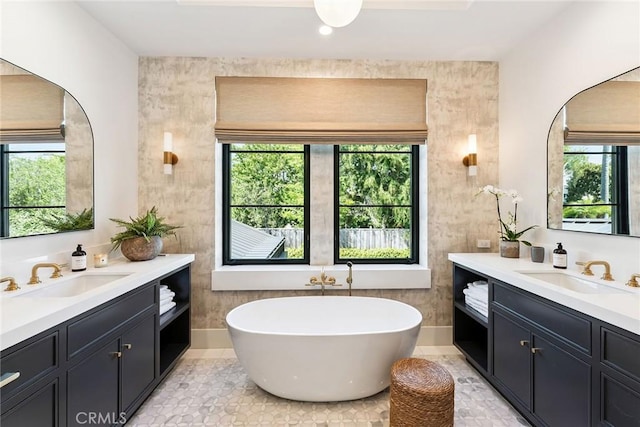 1831 Newport Hills Dr E, Newport Beach, CA 92660 - bathroom with plenty of natural light, two vanities, and a freestanding tub