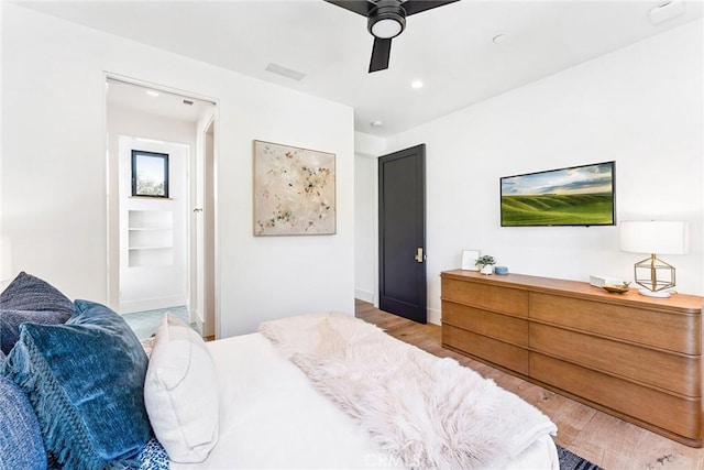 1831 Newport Hills Dr E, Newport Beach, CA 92660 - bedroom featuring wood finished floors, a ceiling fan, and recessed lighting