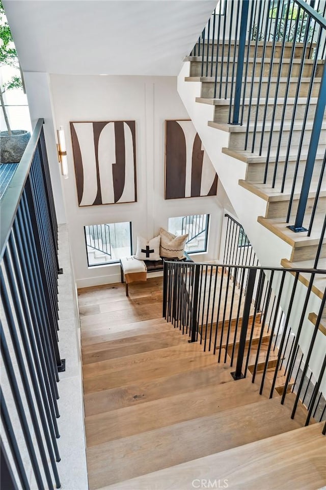 1831 Newport Hills Dr E, Newport Beach, CA 92660 - stairs featuring wood finished floors and healthy amount of natural light
