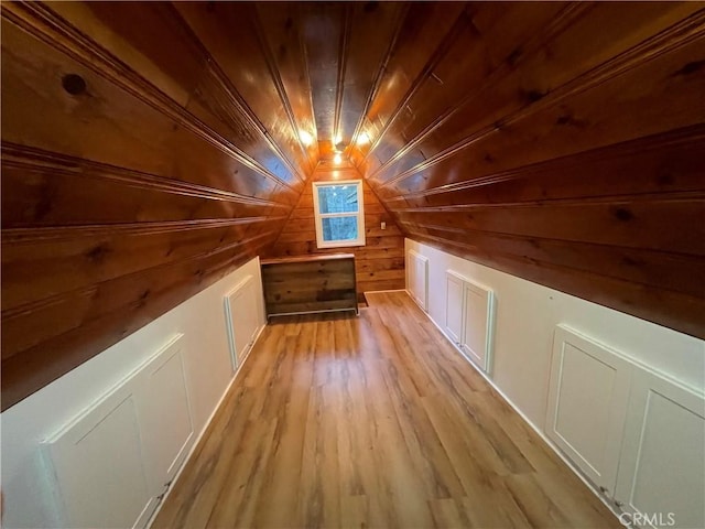 651 Community Dr, Lake Arrowhead, CA 92352 - additional living space with light wood finished floors, wood walls, wood ceiling, and vaulted ceiling