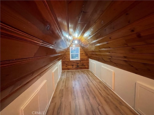 651 Community Dr, Lake Arrowhead, CA 92352 - additional living space featuring wooden ceiling, wood walls, lofted ceiling, and light wood finished floors