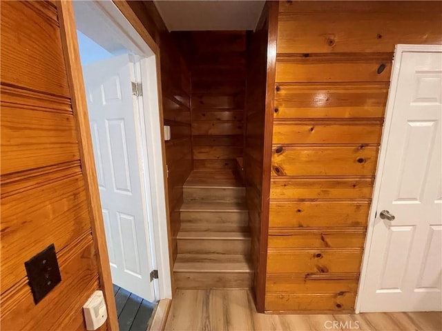 651 Community Dr, Lake Arrowhead, CA 92352 - stairs featuring wood finished floors and wooden walls