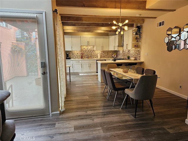 400 Monterey Rd Unit 10, Glendale, CA 91206 - dining area with a chandelier, beamed ceiling, and dark wood-style floors