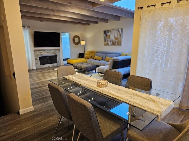 400 Monterey Rd Unit 10, Glendale, CA 91206 - living room with beamed ceiling, dark wood-style floors, and a fireplace
