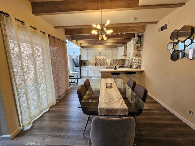 400 Monterey Rd Unit 10, Glendale, CA 91206 - dining space featuring a chandelier, beam ceiling, and dark wood-style flooring