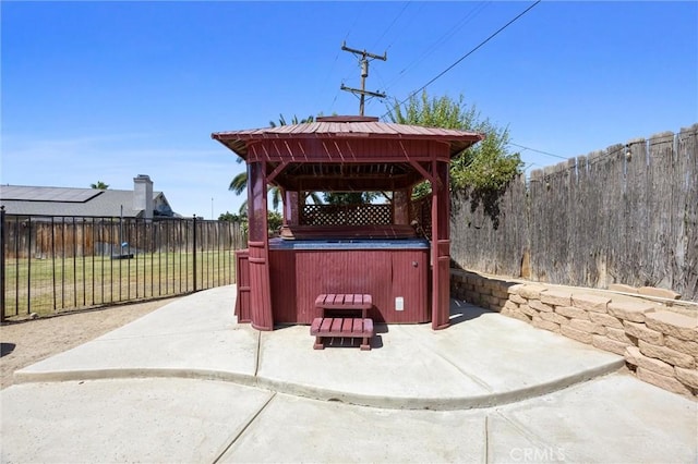 3108 Holbrook St, Bakersfield, CA 93312 - fenced backyard with a hot tub, a gazebo, and a patio
