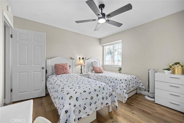 3108 Holbrook St, Bakersfield, CA 93312 - bedroom featuring wood finished floors and a ceiling fan