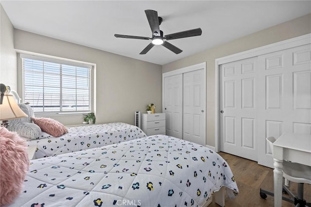 3108 Holbrook St, Bakersfield, CA 93312 - bedroom featuring two closets, wood finished floors, and a ceiling fan