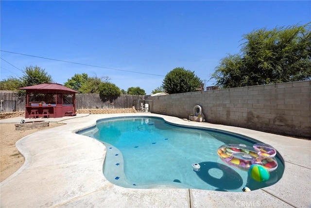 3108 Holbrook St, Bakersfield, CA 93312 - view of swimming pool with a gazebo, a fenced backyard, and a patio area