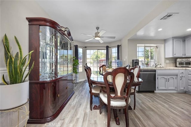 3108 Holbrook St, Bakersfield, CA 93312 - dining room featuring light wood finished floors, a ceiling fan, and recessed lighting