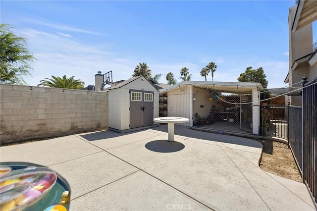3108 Holbrook St, Bakersfield, CA 93312 - fenced backyard featuring a shed and a patio