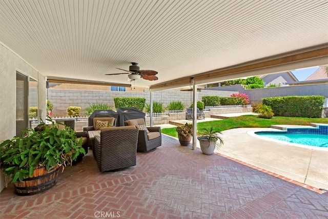 6939 Fremontia Ave, Fontana, CA 92336 - fenced backyard featuring a patio and a ceiling fan