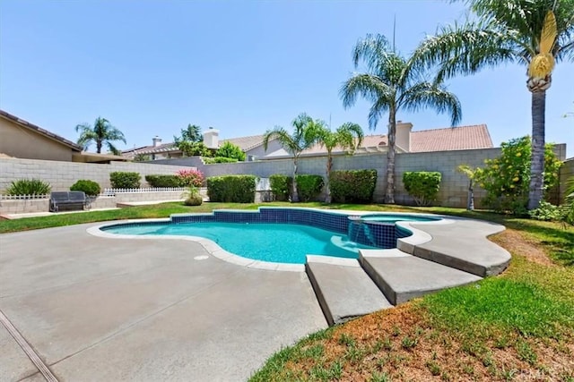 6939 Fremontia Ave, Fontana, CA 92336 - view of pool featuring a pool with connected hot tub, a fenced backyard, and a patio area