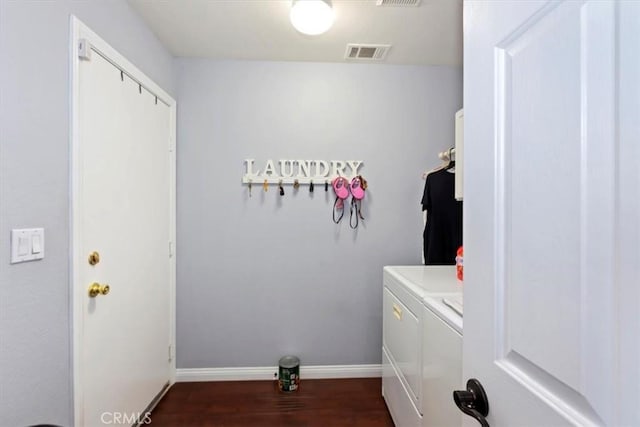 6939 Fremontia Ave, Fontana, CA 92336 - washroom featuring washer and dryer and dark wood finished floors