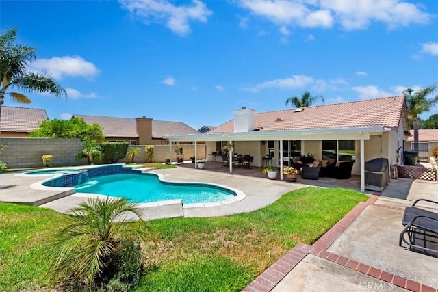 6939 Fremontia Ave, Fontana, CA 92336 - view of pool featuring a pool with connected hot tub, a fenced backyard, a patio area, and outdoor lounge area