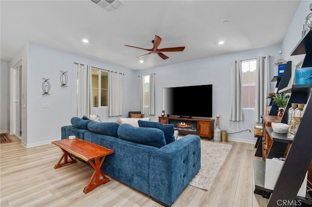 8234 Traveller St, Chino, CA 91710 - living room with recessed lighting, a ceiling fan, and light wood-style floors