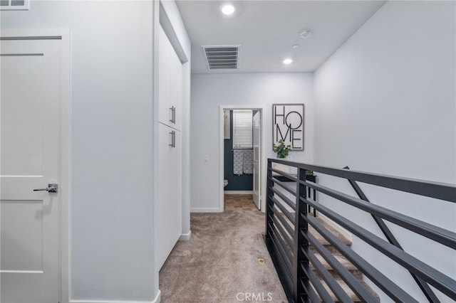 8234 Traveller St, Chino, CA 91710 - hall featuring light carpet, an upstairs landing, and recessed lighting