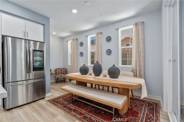 8234 Traveller St, Chino, CA 91710 - dining room featuring light wood-style floors and recessed lighting