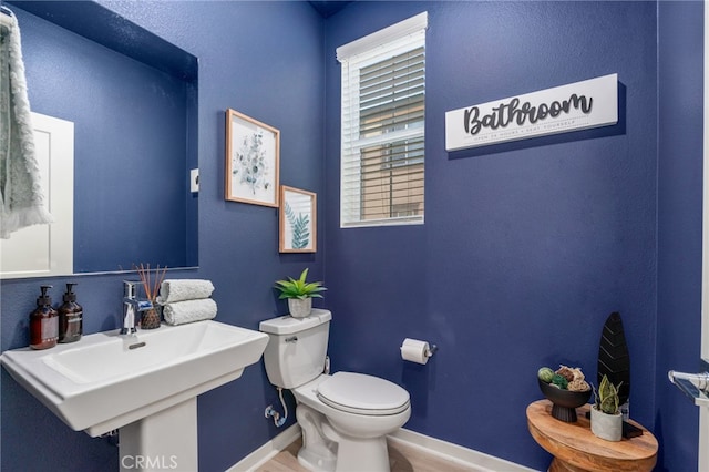 8234 Traveller St, Chino, CA 91710 - half bath featuring toilet and baseboards