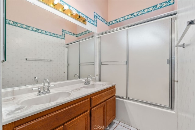 22533 Kinross Ln, Moreno Valley, CA 92557 - full bath featuring double vanity, combined bath / shower with glass door, and tile patterned flooring