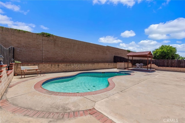 22533 Kinross Ln, Moreno Valley, CA 92557 - view of swimming pool featuring a gazebo, a patio area, and a fenced backyard