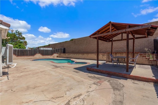 22533 Kinross Ln, Moreno Valley, CA 92557 - view of swimming pool with a fenced backyard, a patio area, and a pool with connected hot tub