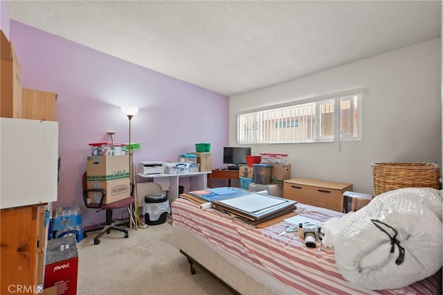 6186 Abronia Ave Unit 29, Palms, CA 92277 - carpeted bedroom with a textured ceiling and an office area