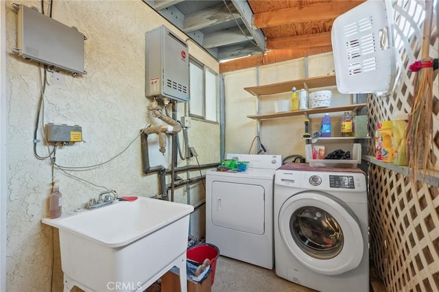 6186 Abronia Ave Unit 29, Palms, CA 92277 - laundry area featuring washer and clothes dryer