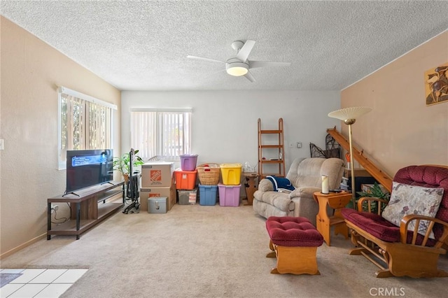 6186 Abronia Ave Unit 29, Palms, CA 92277 - sitting room featuring carpet flooring, a ceiling fan, and a textured ceiling