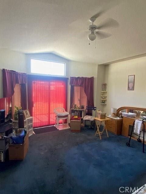 14310 Northstar Ave, Victorville, CA 92392 - living area featuring carpet flooring, ceiling fan, and vaulted ceiling