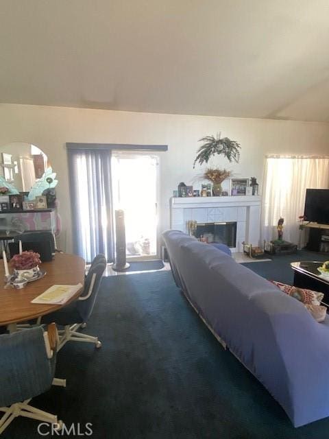 14310 Northstar Ave, Victorville, CA 92392 - carpeted living room featuring a tile fireplace