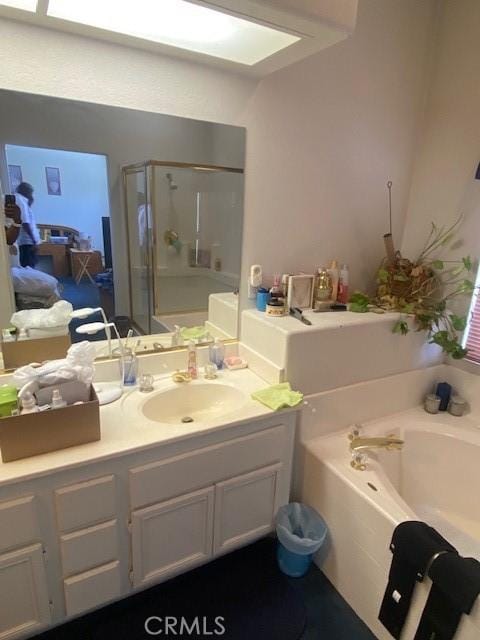 14310 Northstar Ave, Victorville, CA 92392 - bathroom with a bath, a shower stall, and vanity