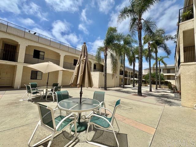 4545 Arizona St Unit 104, San Diego, CA 92116 - view of patio / terrace featuring outdoor dining area