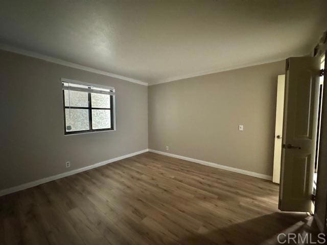 4545 Arizona St Unit 104, San Diego, CA 92116 - empty room with crown molding and dark wood-style flooring