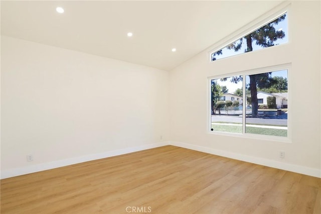 17532 Ludlow St, Granada Hills, CA 91344 - spare room with plenty of natural light, light wood-style flooring, recessed lighting, and high vaulted ceiling