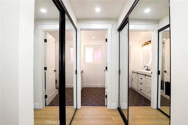 17532 Ludlow St, Granada Hills, CA 91344 - corridor with light wood finished floors and recessed lighting