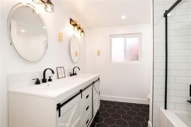 17532 Ludlow St, Granada Hills, CA 91344 - bathroom featuring double vanity, recessed lighting, and tile patterned flooring