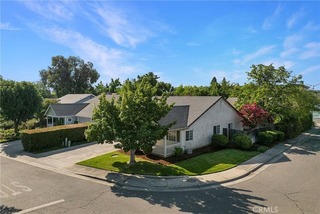 2081 Marilyn Dr, Chico, CA 95928 - view of front facade with concrete driveway, a front lawn, a garage, and stucco siding