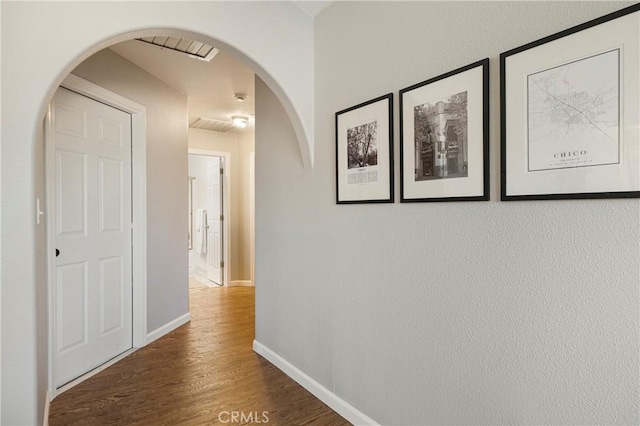 2081 Marilyn Dr, Chico, CA 95928 - corridor featuring arched walkways and wood finished floors