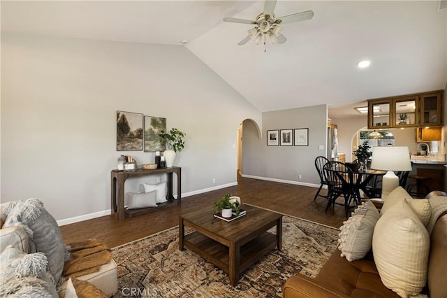 2081 Marilyn Dr, Chico, CA 95928 - living area featuring arched walkways, a ceiling fan, wood finished floors, high vaulted ceiling, and recessed lighting
