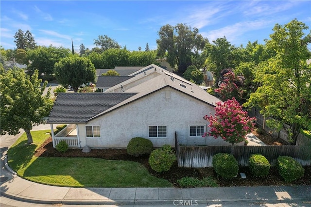 2081 Marilyn Dr, Chico, CA 95928 - view of home's exterior with stucco siding and a shingled roof