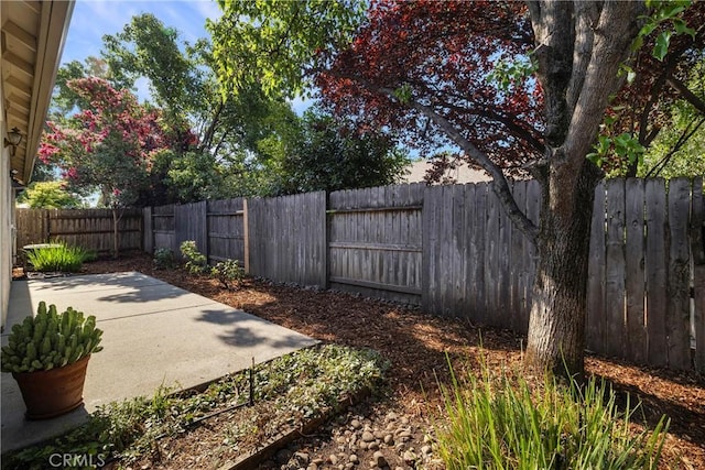 2081 Marilyn Dr, Chico, CA 95928 - fenced backyard featuring a patio