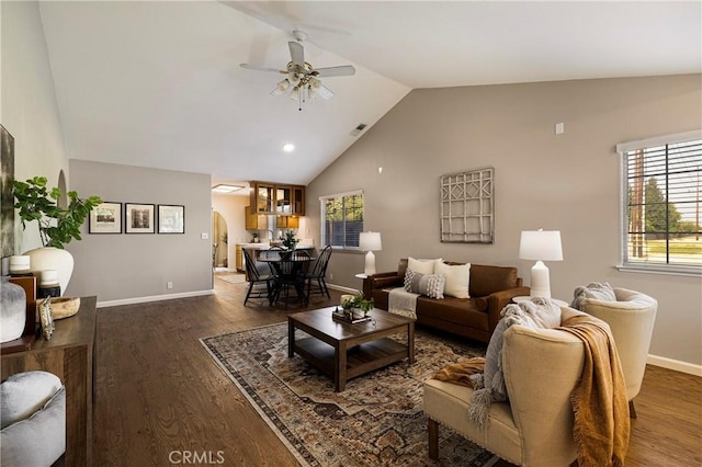 2081 Marilyn Dr, Chico, CA 95928 - living room with a ceiling fan, wood finished floors, arched walkways, and high vaulted ceiling