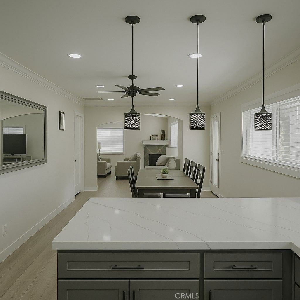 12861 Alamitos Way, Garden Grove, CA 92841 - kitchen with a ceiling fan, light wood-style floors, light stone counters, recessed lighting, and pendant lighting