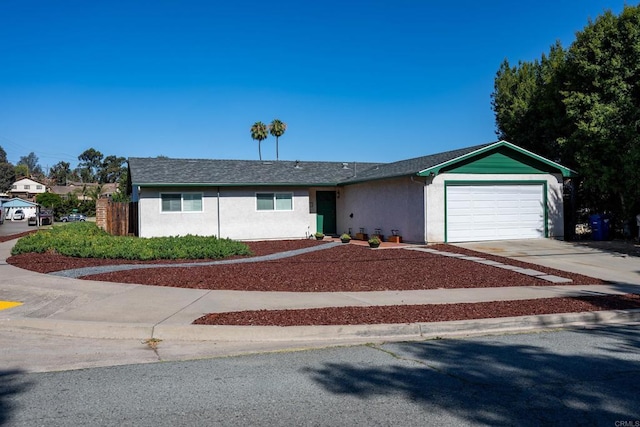 3506 Kenora Dr, Spring Valley, CA 91977 - ranch-style home featuring concrete driveway, an attached garage, and stucco siding