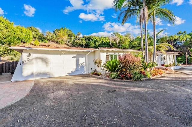 1670 Alta Vista Dr, Vista, CA 92084 - ranch-style house featuring stucco siding and an attached garage