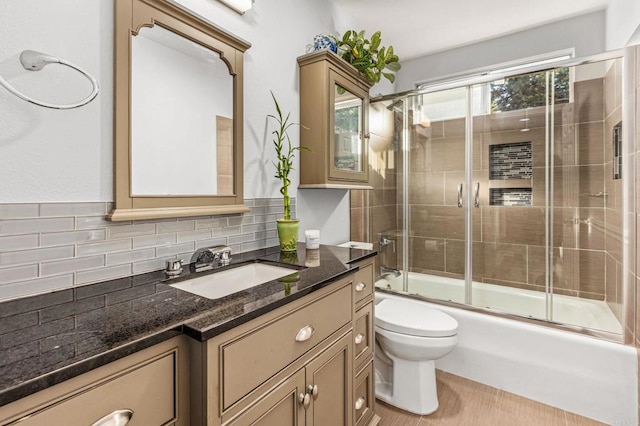 1670 Alta Vista Dr, Vista, CA 92084 - bathroom with vanity, backsplash, and combined bath / shower with glass door